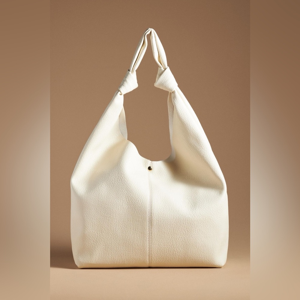 NWOT Anthropologie The Love Knot Slouchy Bag in Ivory Faux Leather